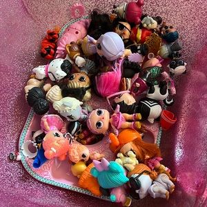 Lot of LOL dolls and accessories